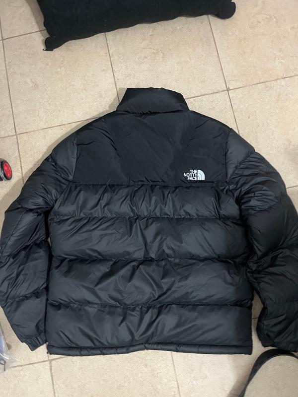 מעיל פוך שחור של The North Face